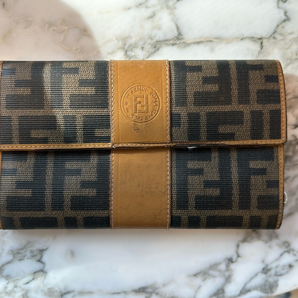 Women’s tri-fold authentic Fendi wallet.
